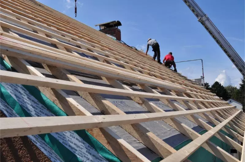 two-builder-on-an-open-rooftop-1.webp